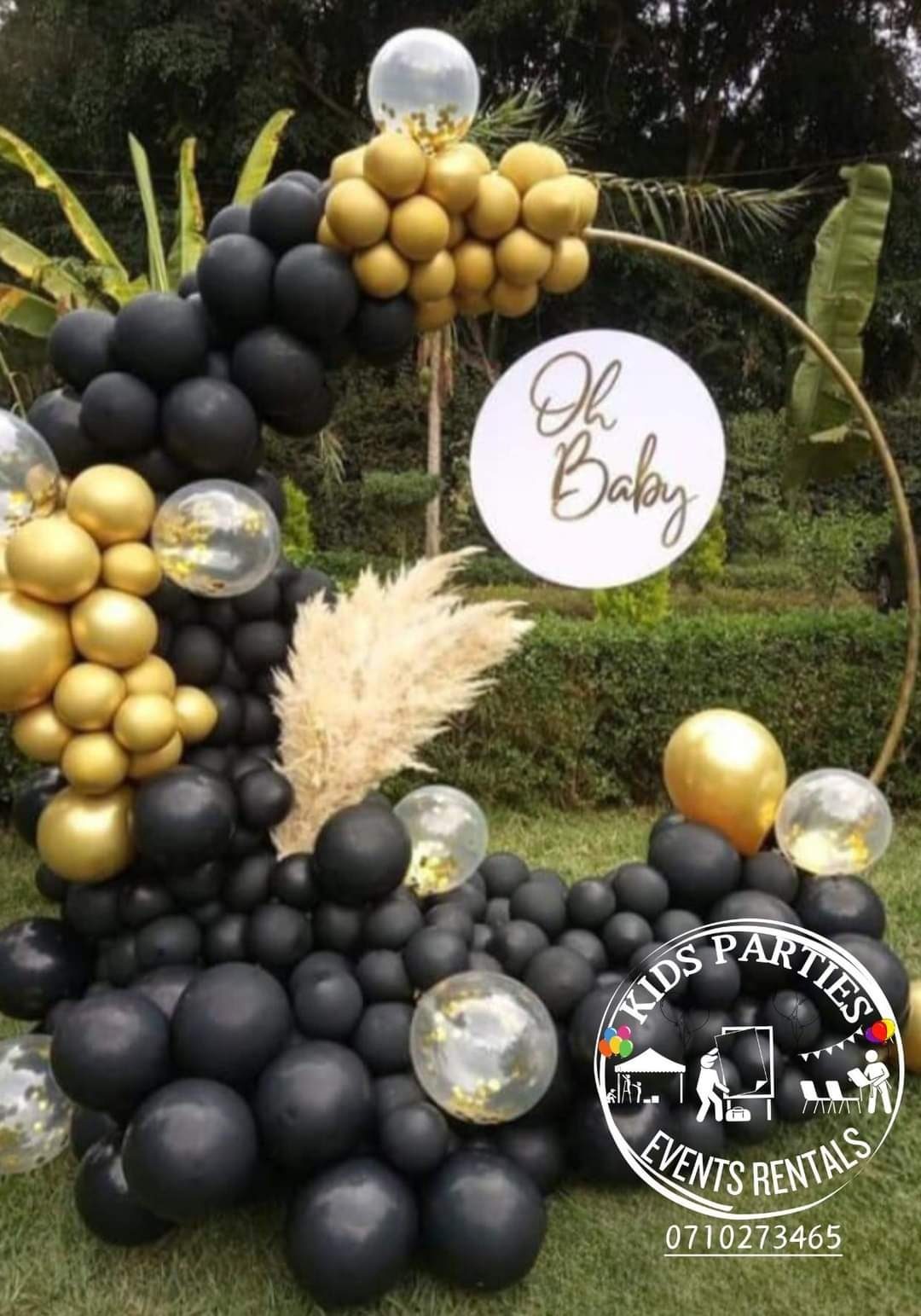 The Luxe Geometry Hula Hoop Backdrop and Cake Stand with Balloons Styling for Hire for a kids birthday party in Nairobi