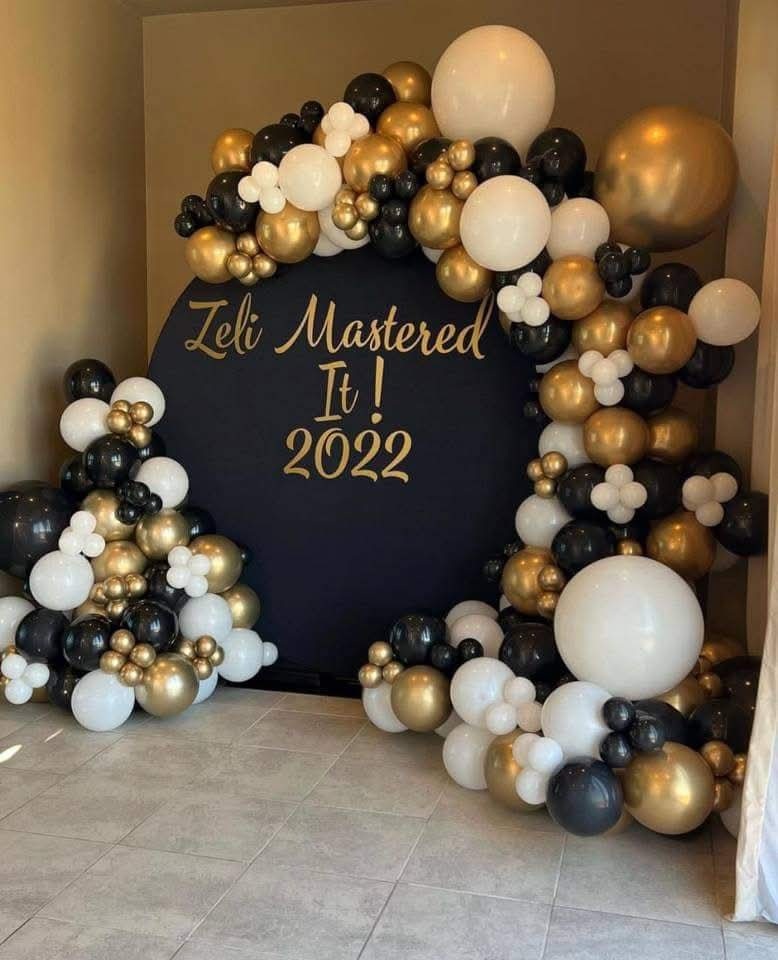 Luxe Round Board Balloon Arch and Pedestal Cake Stand with Themed Balloons Decor for Hire for a kids birthday party in Nairobi